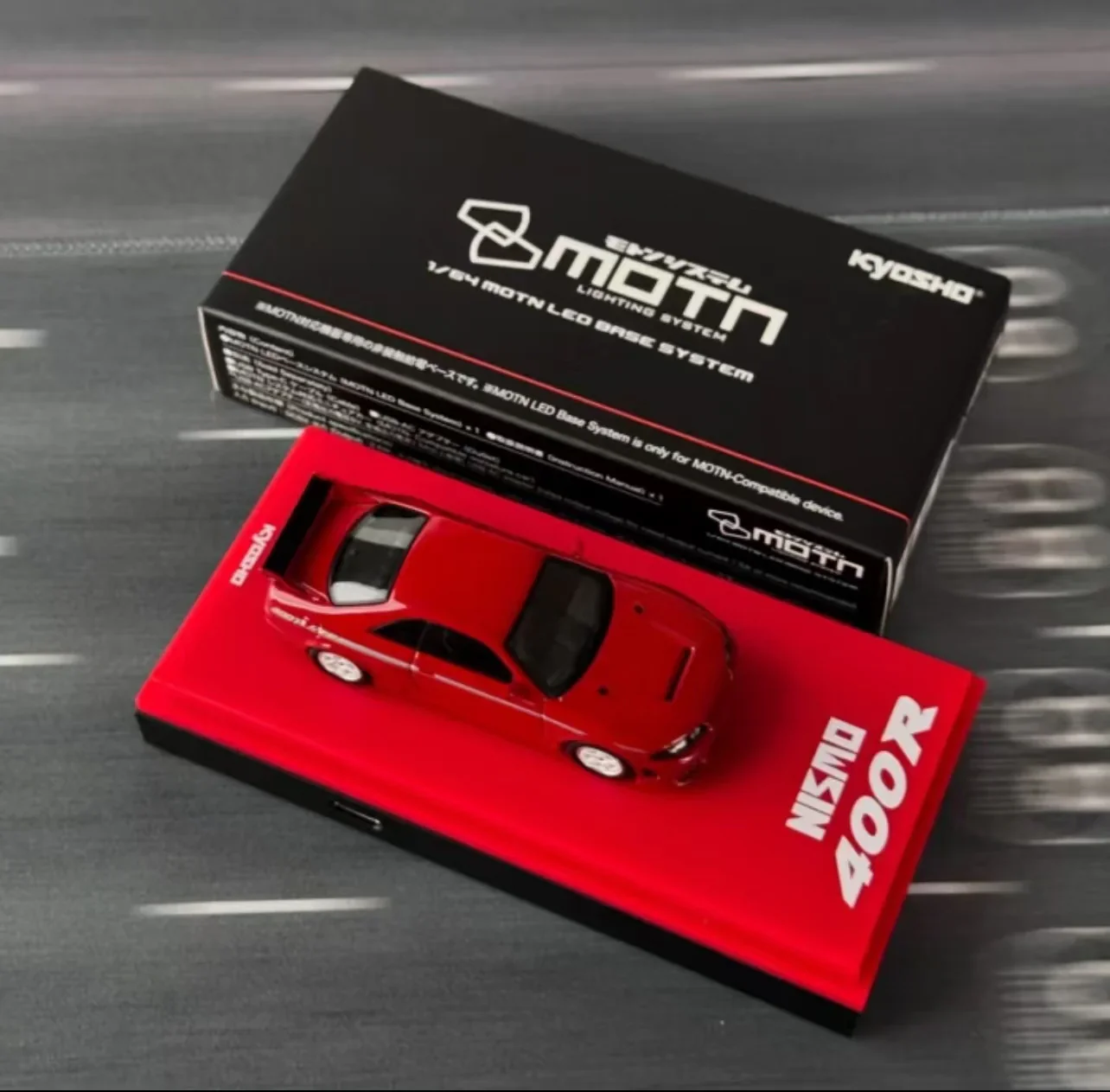 Kyosho 1:64 Nissan Nismo 400R Tokyo Auto Salon KL Edition in Red (MOTN LED Base Compatible) ONE PER CUSTOMER PER ORDER - Image 3