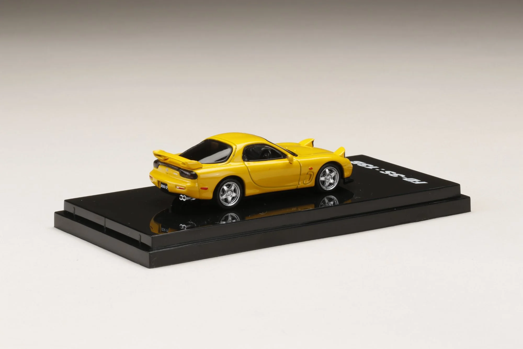 Hobby Japan 1:64 Mazda RX-7 (FD3S) Type RS in Sunburst Yellow with Engine Display Model - Image 3