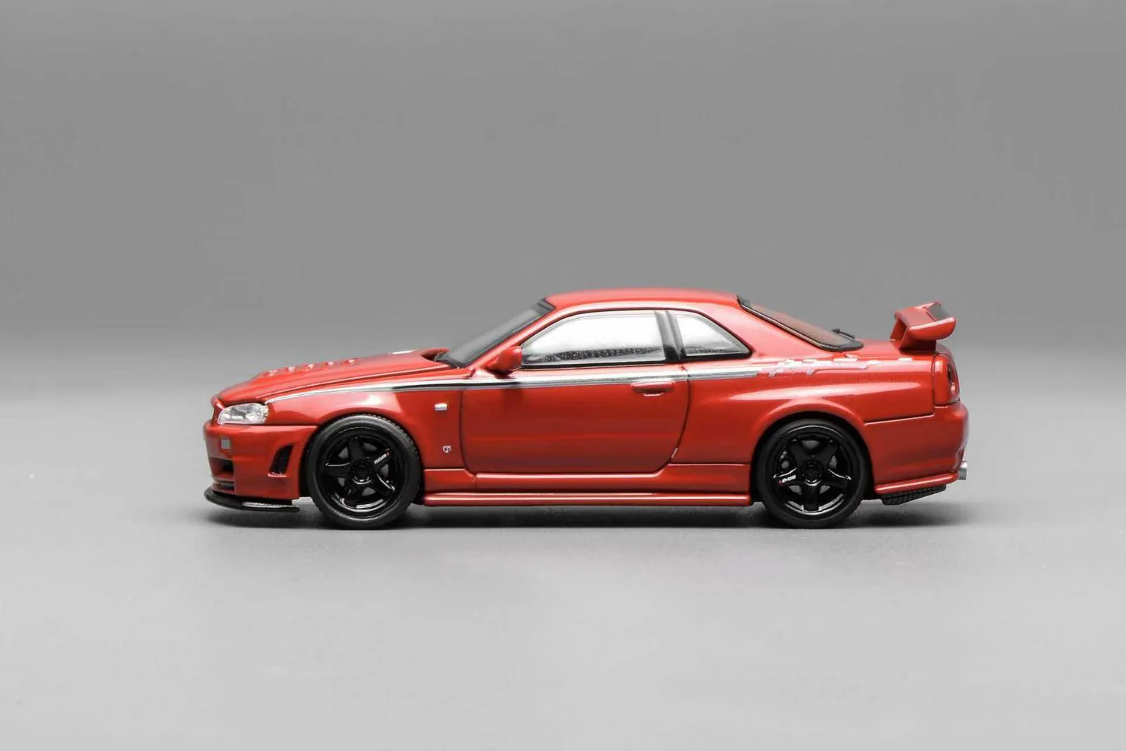 *PREORDER* MotorHelix 1:64 Nissan Skyline GT-R (R34) Nismo Customized - Nismo Red - Image 3
