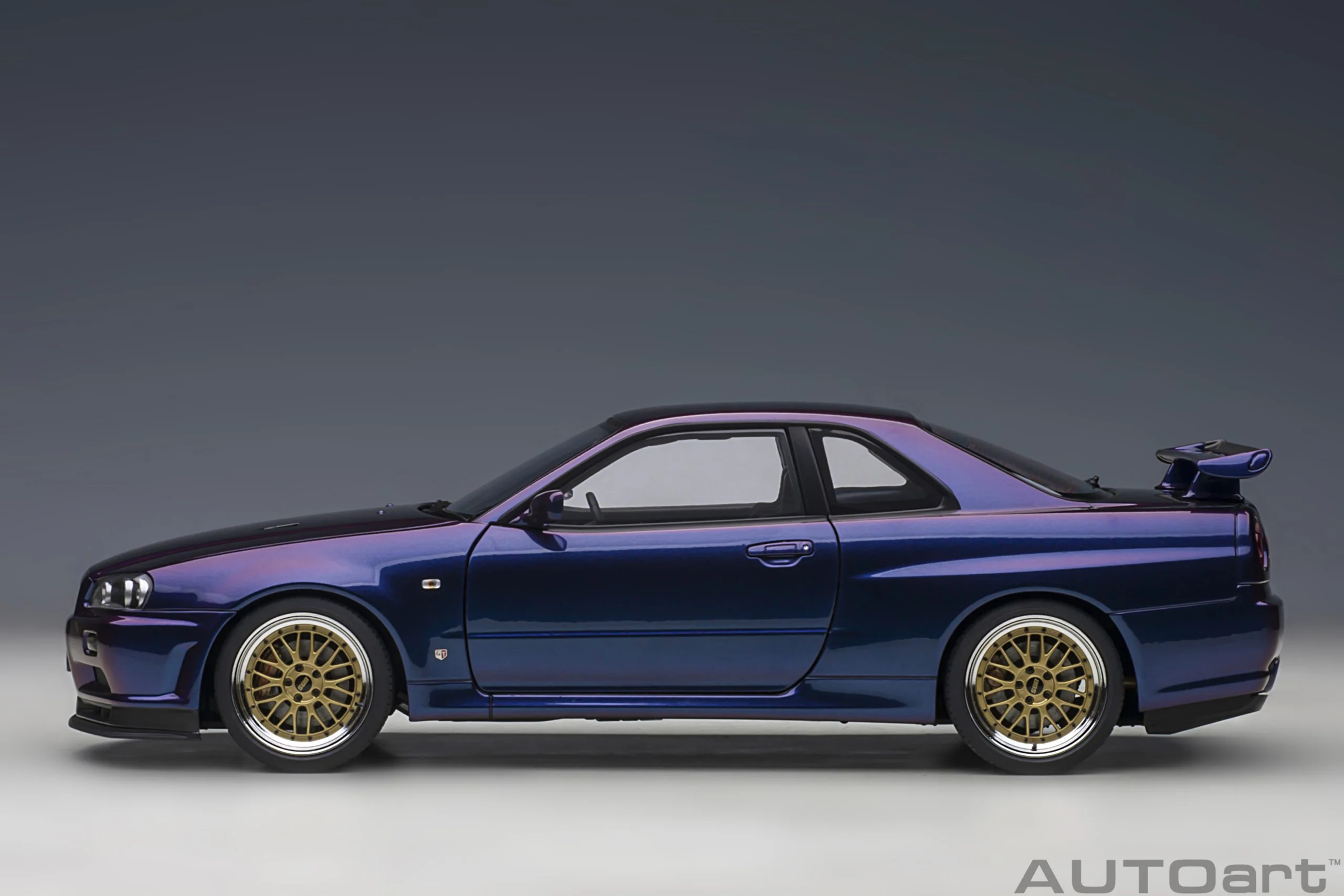 AUTOart 1:18 Nissan Skyline GT-R (R34) V-Spec II in Midnight Purple III with BBS LM Wheels - Image 2