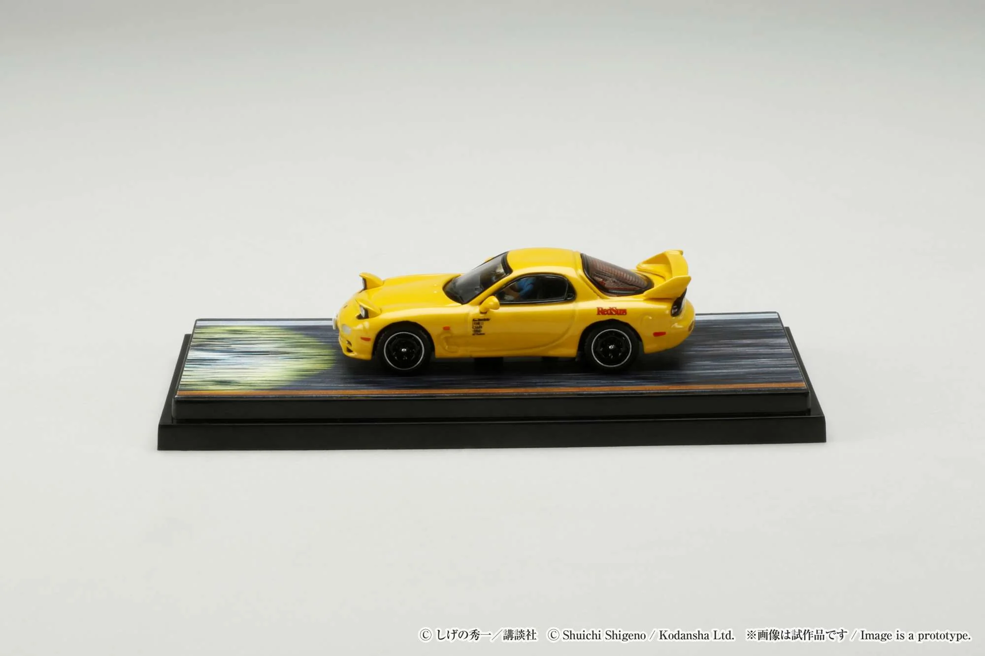Hobby Japan 1:64 Mazda RX-7 (FD3S) Red Suns Initial D vs Takeshi Nakazato with Keisuke Takahashi Figure - Image 5