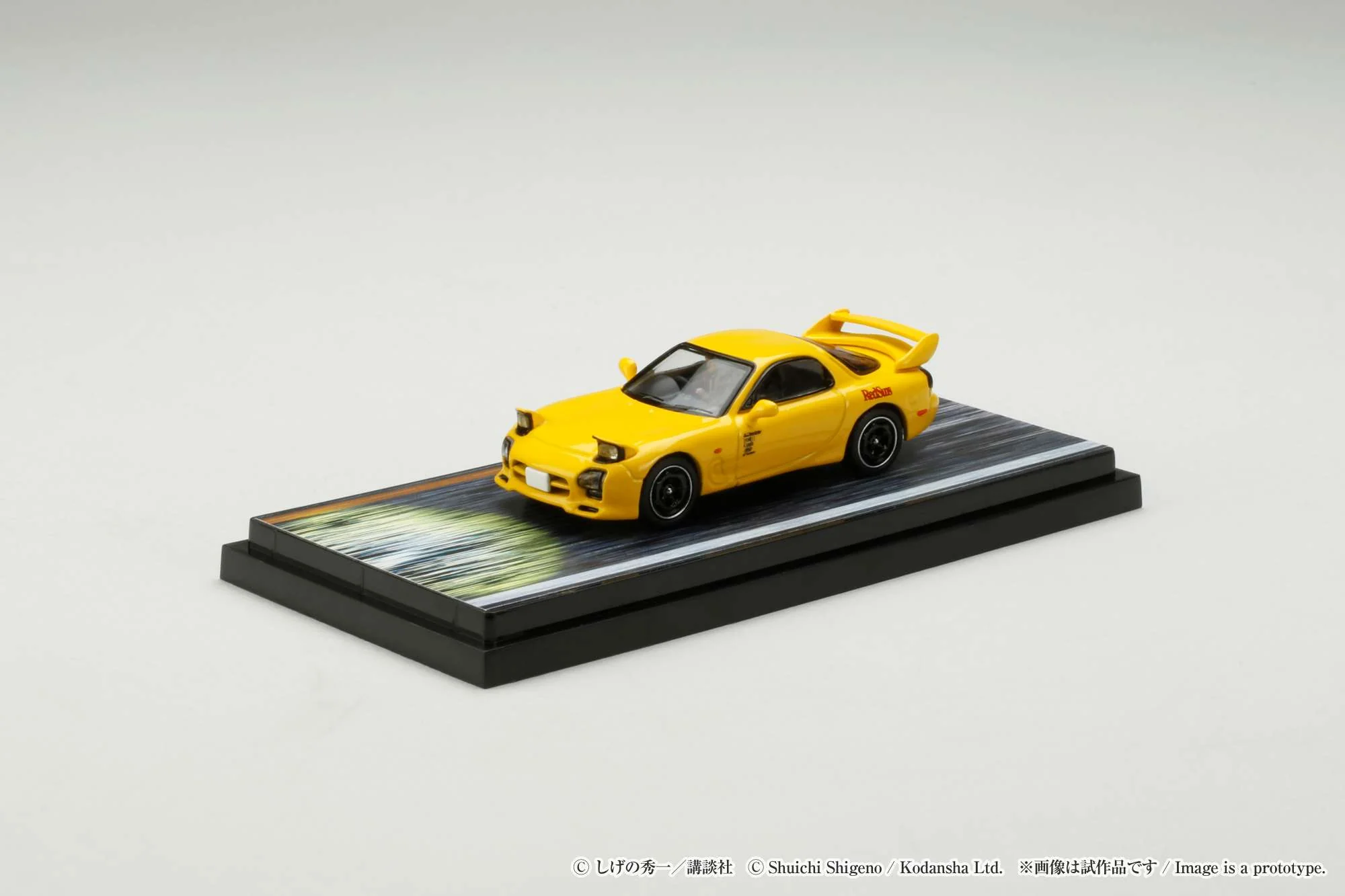Hobby Japan 1:64 Mazda RX-7 (FD3S) Red Suns Initial D vs Takumi Fujiwara with Keisuke Takahashi Figure - Image 4