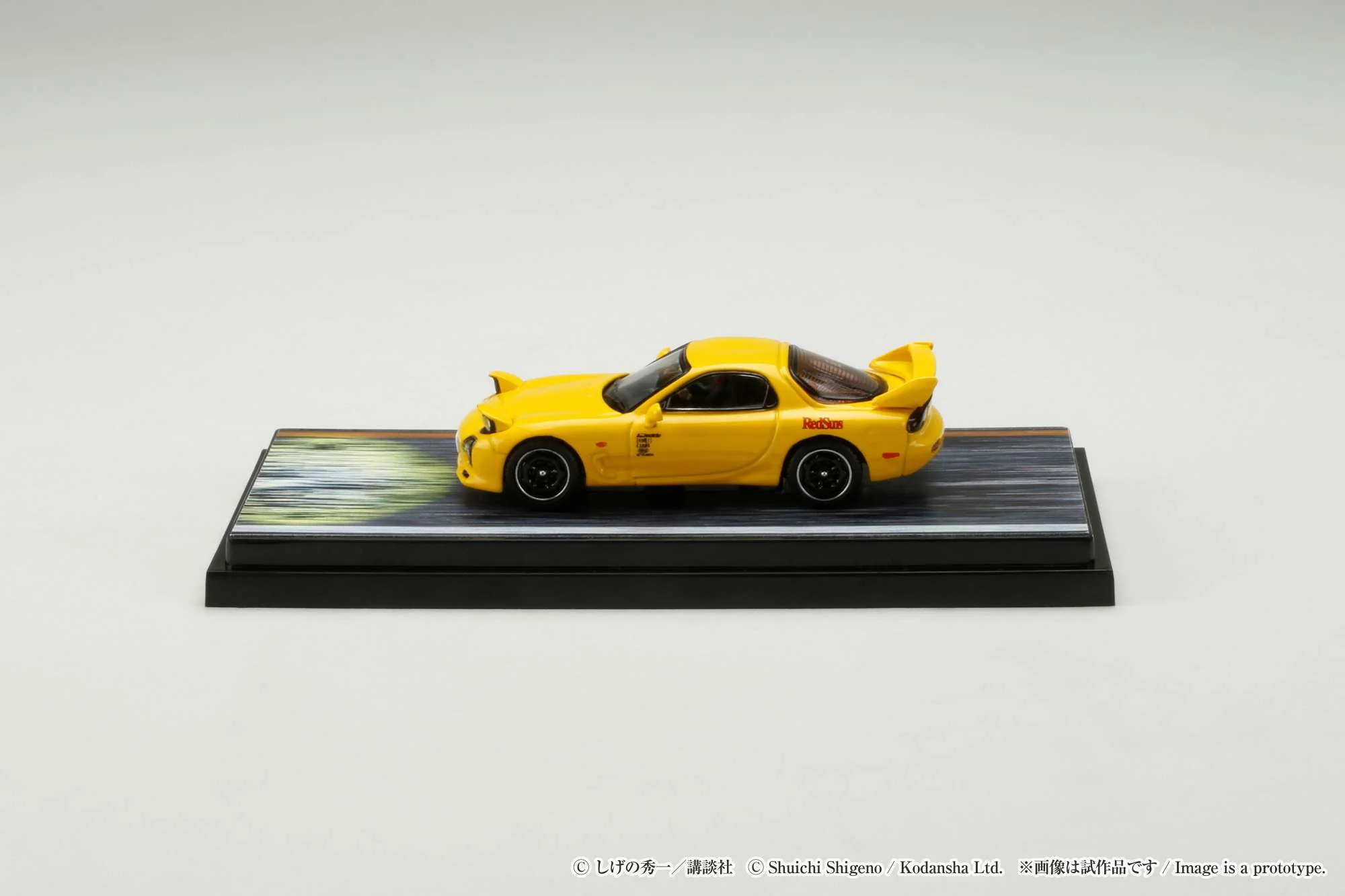 Hobby Japan 1:64 Mazda RX-7 (FD3S) Red Suns Initial D vs Takumi Fujiwara with Keisuke Takahashi Figure - Image 5