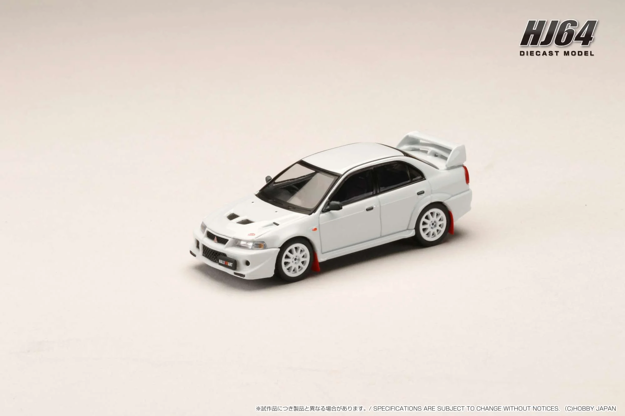 Hobby Japan 1:64 Mitsubishi Lancer GSR EVO 6 (T.M.E.) Monte Carlo Edition in Scortia White