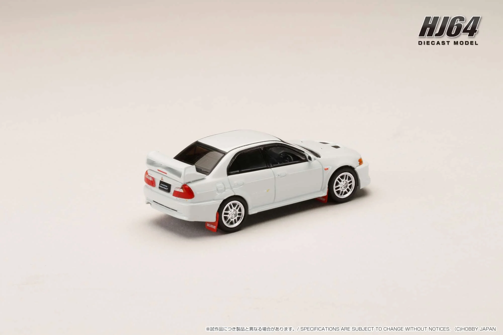 Hobby Japan 1:64 Mitsubishi Lancer GSR EVO V 1998 with Mud Flap in Scortia White - Image 2
