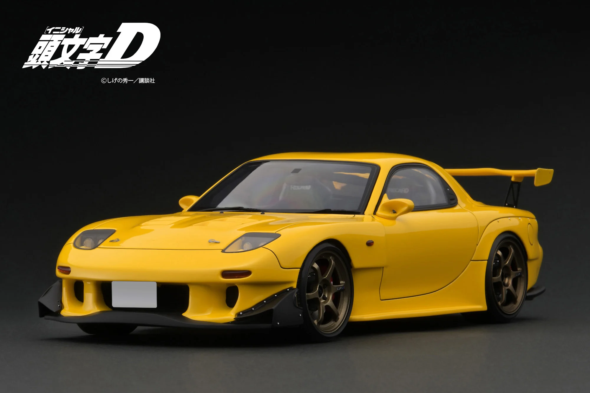 Ignition Model 1:18 Initial D Mazda RX-7 (FD3S) Yellow with Mr. Keisuke Takahashi - Image 3
