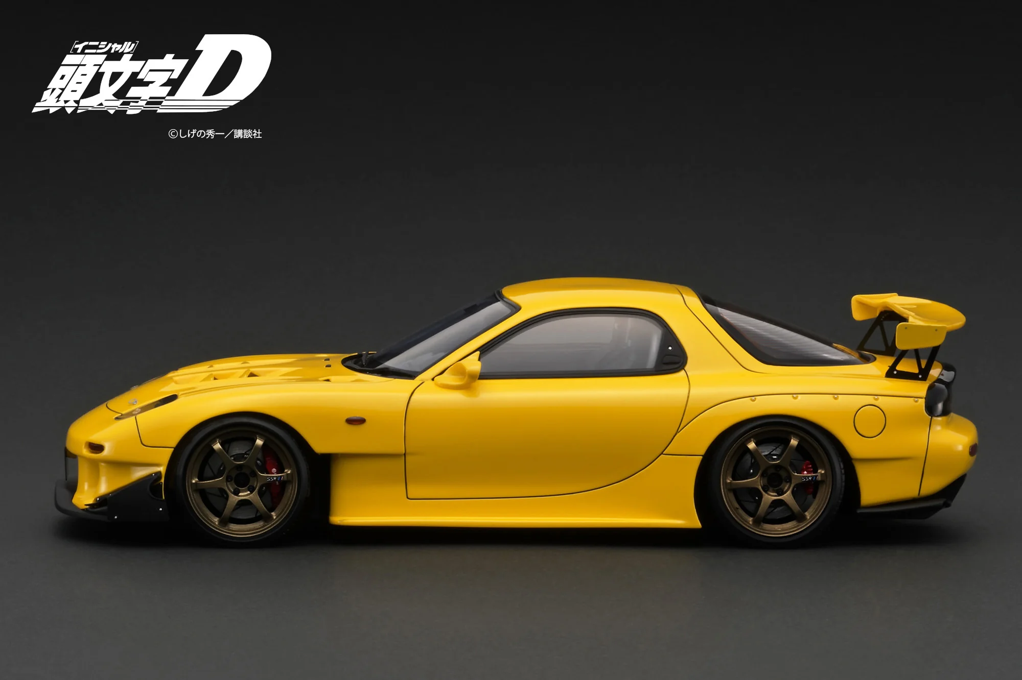 Ignition Model 1:18 Initial D Mazda RX-7 (FD3S) Yellow with Mr. Keisuke Takahashi - Image 4