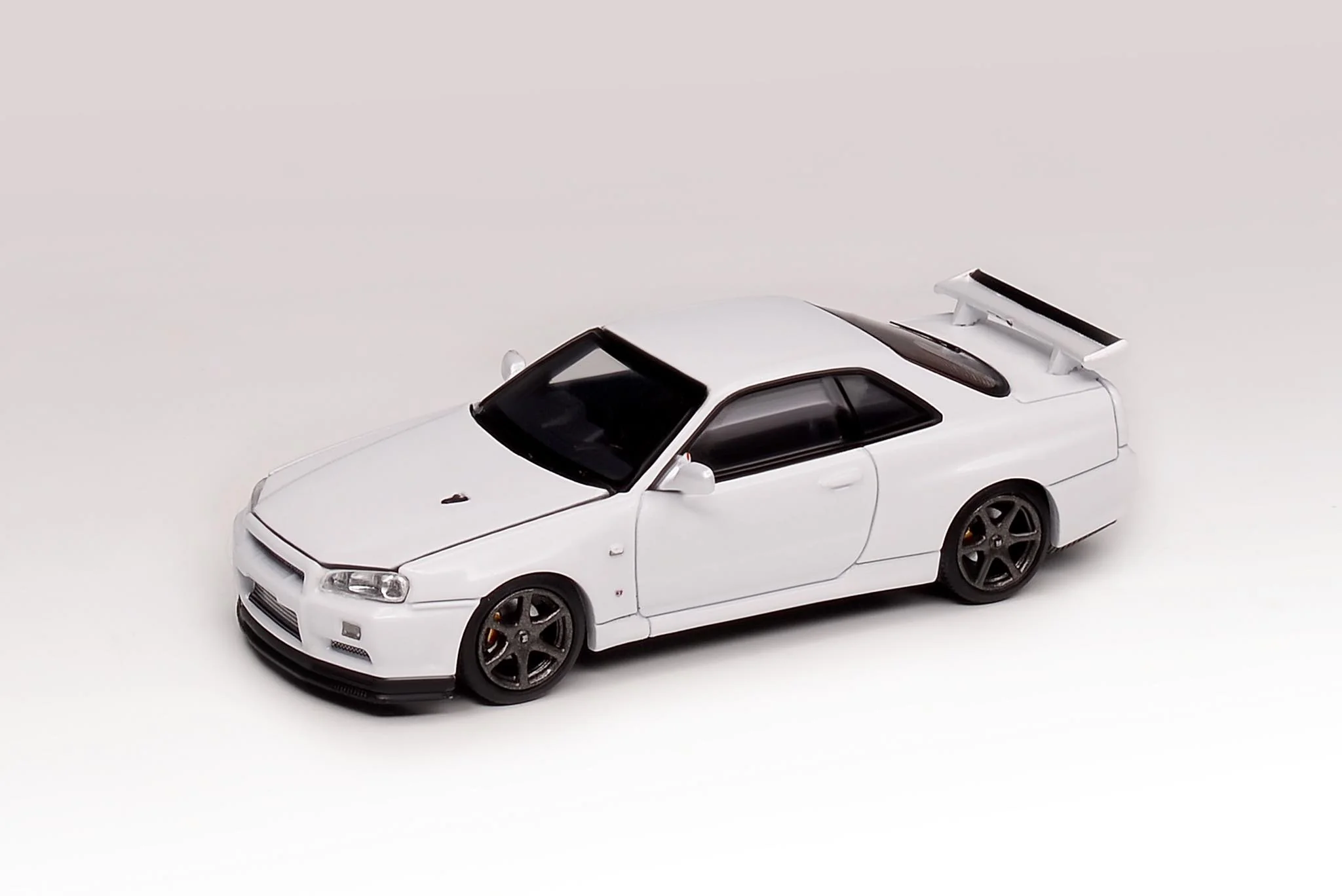 MotorHelix 1/64 Nissan Skyline GT-R (BNR34) in Pearl White - Image 2