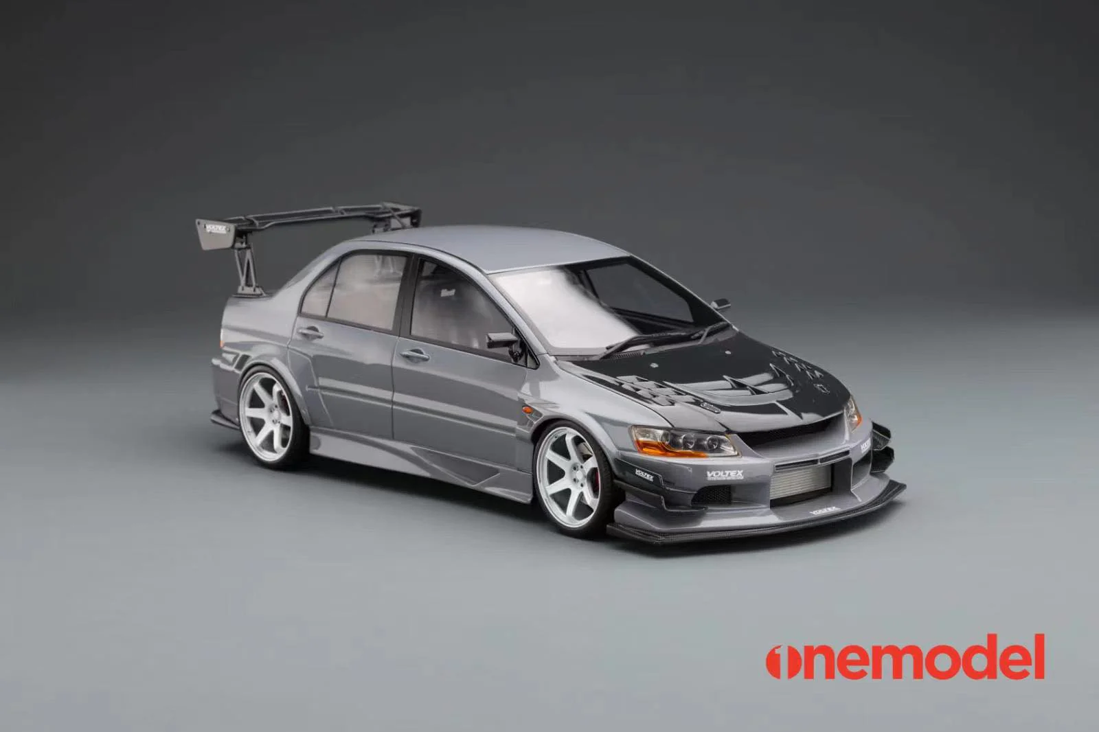 One Model 1:18 Mitsubishi Lancer Evolution IX Voltex with Carbon Bonnet in Iron Gray - Image 9