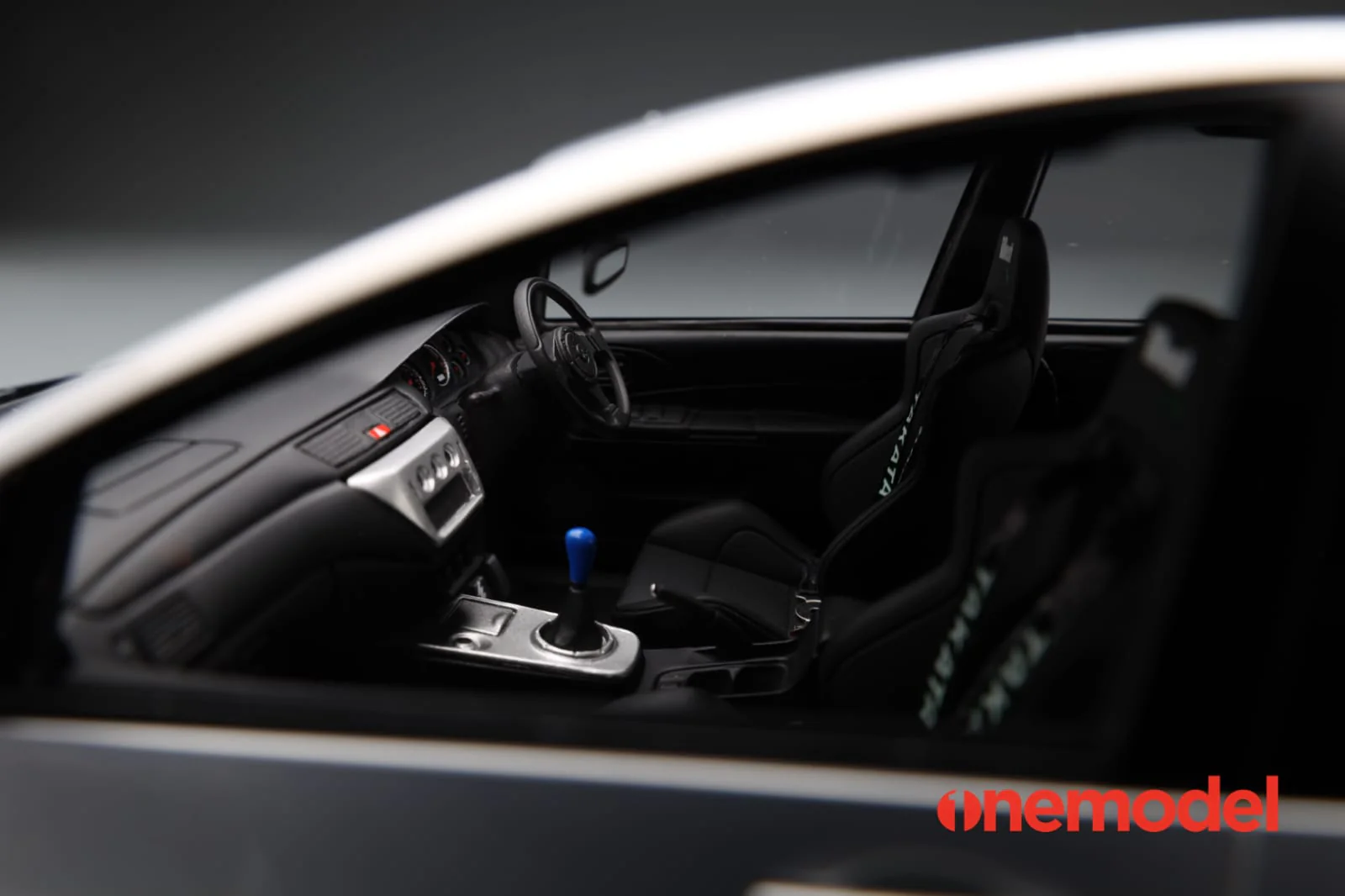 One Model 1:18 Mitsubishi Lancer Evolution IX Voltex with Carbon Bonnet in Silver - Image 3