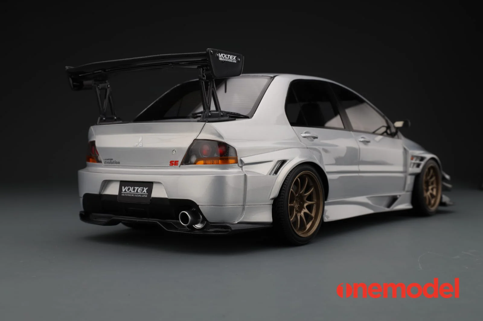 One Model 1:18 Mitsubishi Lancer Evolution IX Voltex with Carbon Bonnet in Silver - Image 7