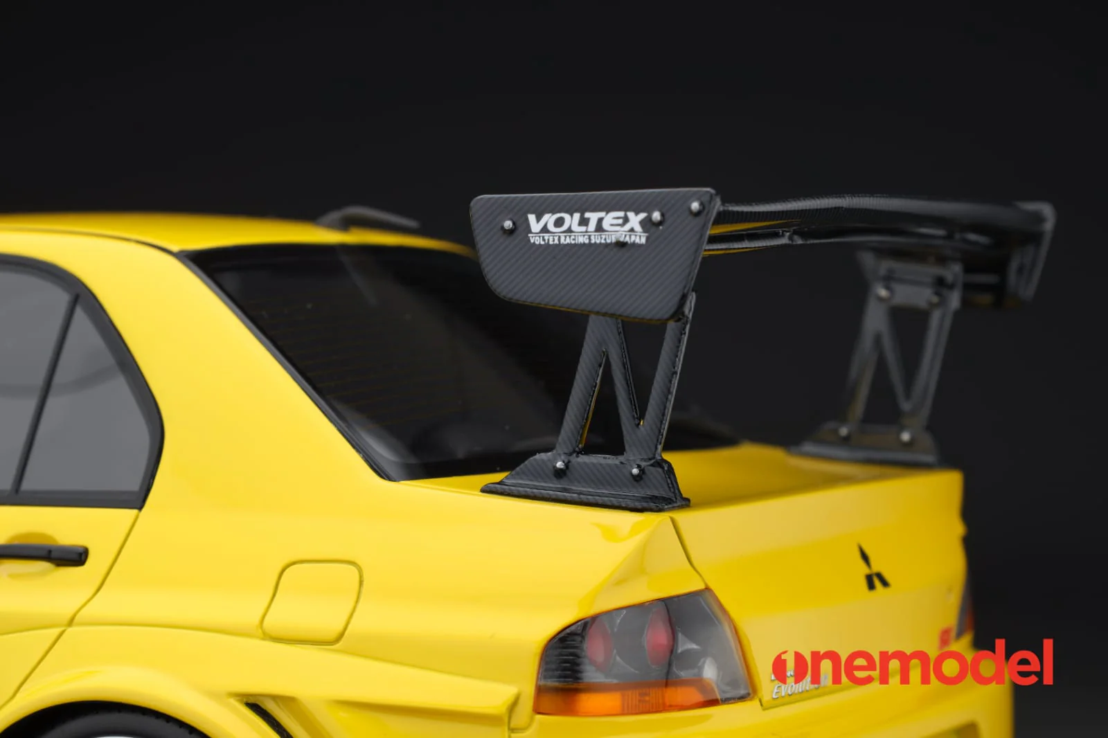 One Model 1:18 Mitsubishi Lancer Evolution IX Voltex with Carbon Bonnet in Yellow - Image 5
