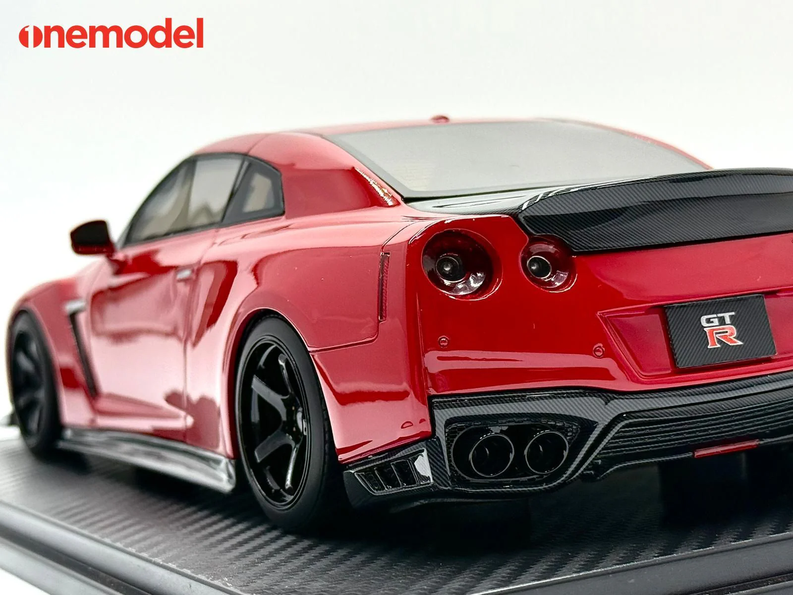 One Model 1:18 Nissan GT-R R35 Custom Edition in Passion Red - Image 9